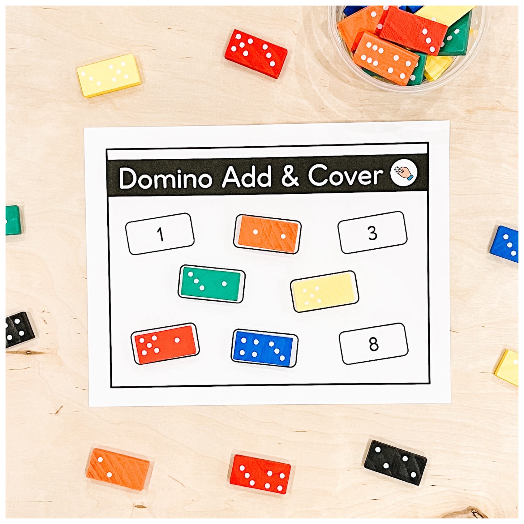 An addition centre for Kindergarten where students add the two sides of dominos and place them on the correct sum on the mat