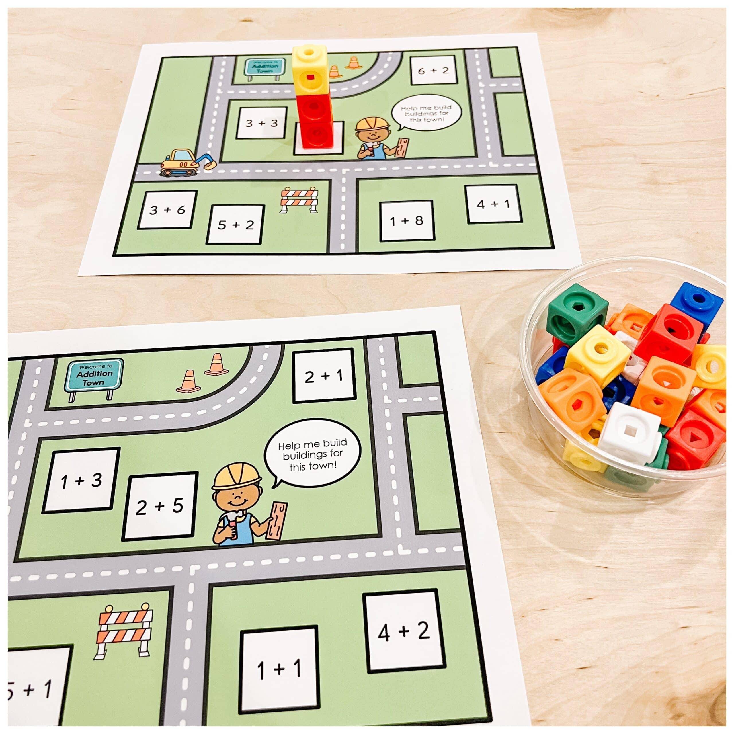 An addition centre for Kindergarten where students build buildings for "Addition Town" by following the equations and using snap cubes